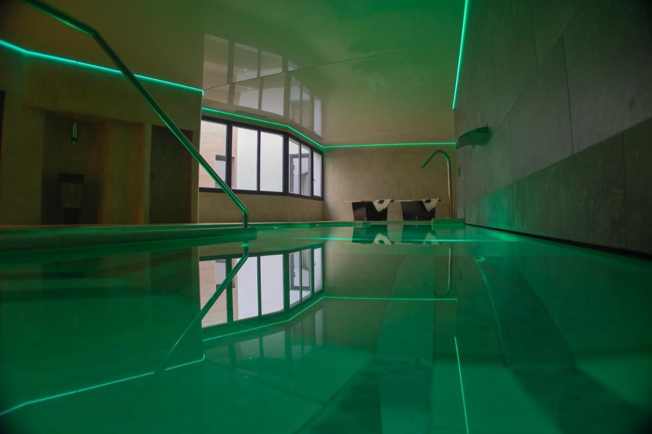 Oikos Apartamentos Turisticos 莫内斯特里奥 外观 照片