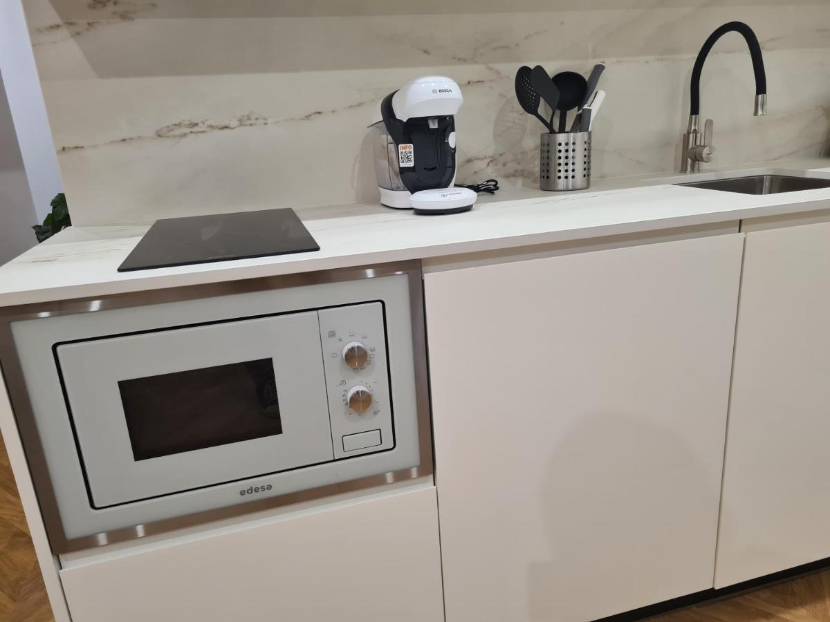 Oikos Apartamentos Turisticos 莫内斯特里奥 外观 照片