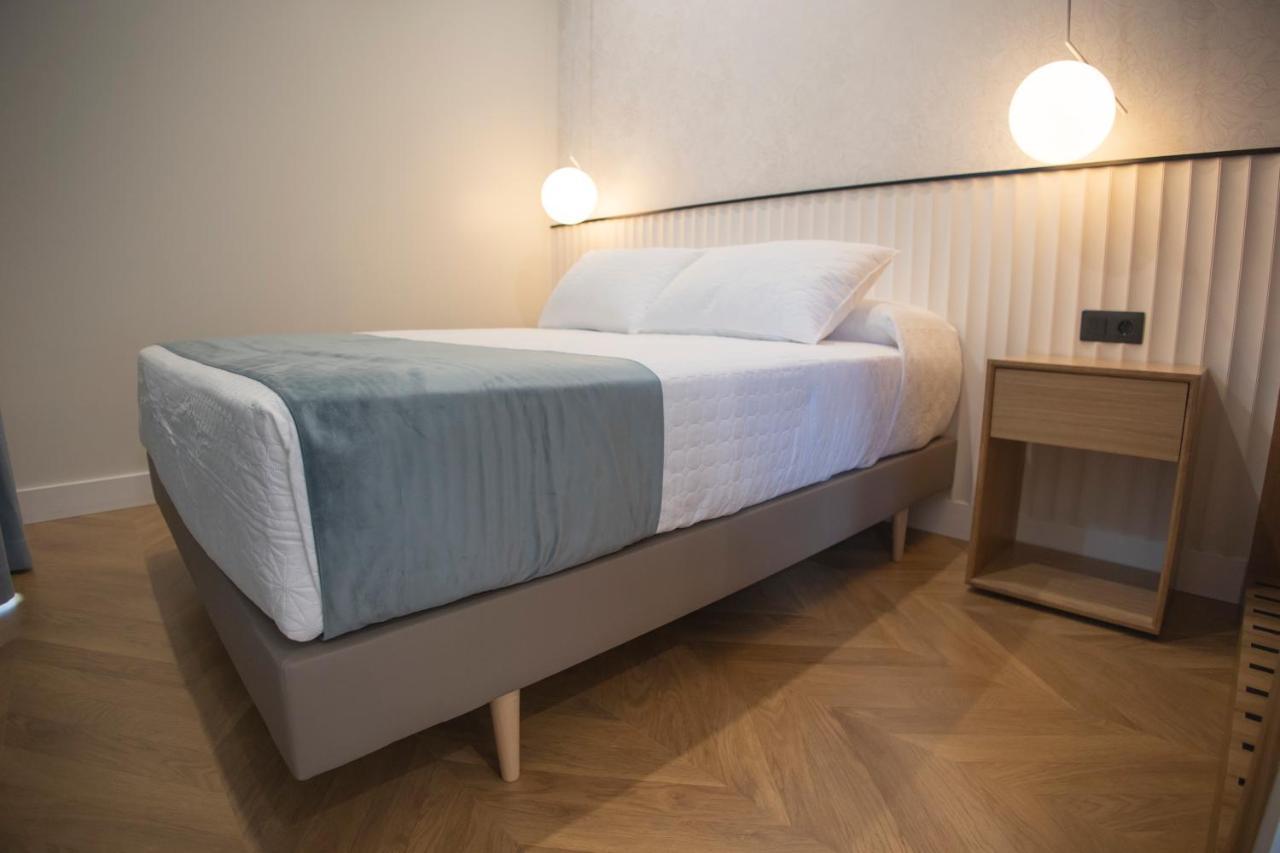 Oikos Apartamentos Turisticos 莫内斯特里奥 外观 照片