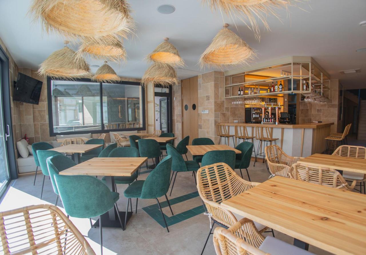 Oikos Apartamentos Turisticos 莫内斯特里奥 外观 照片